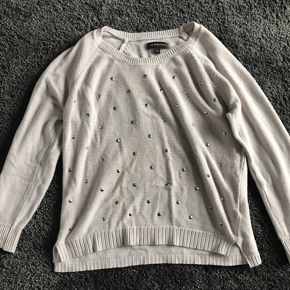 Tan sweater with stud detailing
